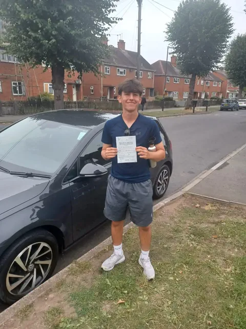 Happy student after passing driving test in Coventry